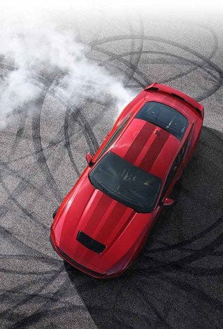 Overhead view of a 2024 Ford Mustang® model with tire tracks on pavement | E. J. Barrette and Sons in Swanton VT