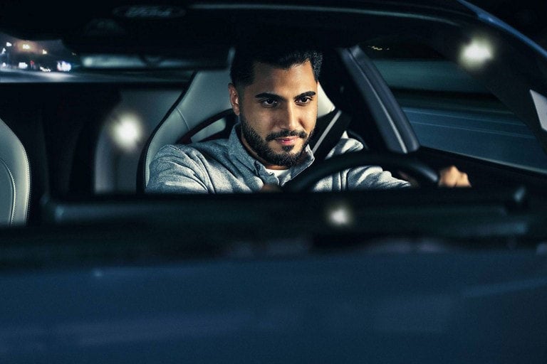Person sitting in the driver’s seat of a parked 2024 Ford Mustang® coupe | E. J. Barrette and Sons in Swanton VT
